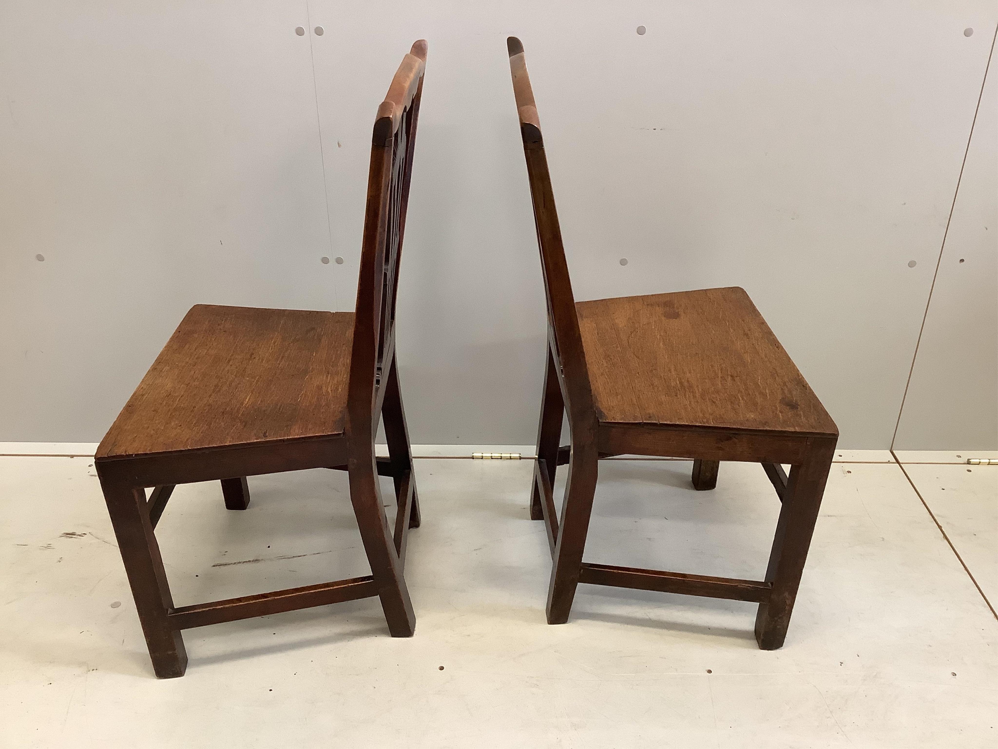 A pair of Chippendale style mahogany dining chairs, height 91cm. Condition - fair